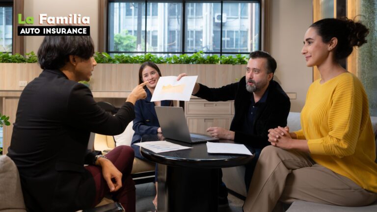 Bilingual insurance agent explaining auto coverage options to a Spanish-speaking customer.